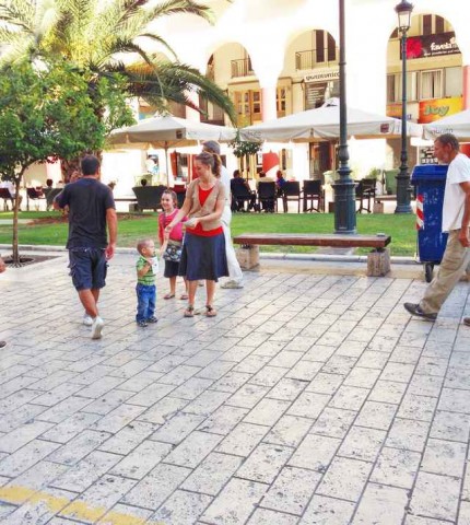 Rachel and kids passing out tracts in the city