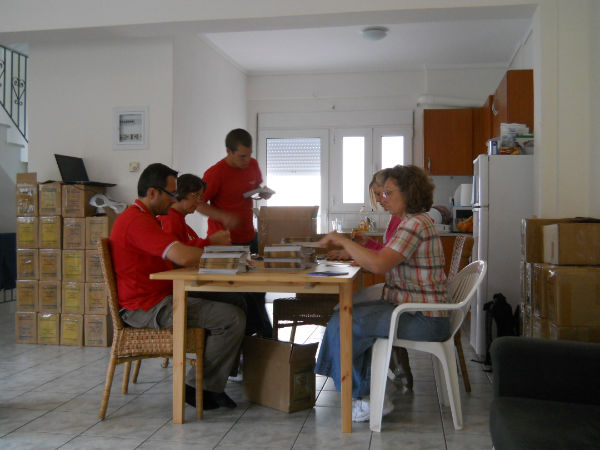 Open, slide, stamp then pack, 7min per box