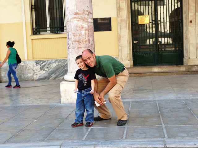 Little Charlie and Big Charlie passing out tracts