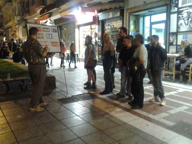 A small crowd listening to the message